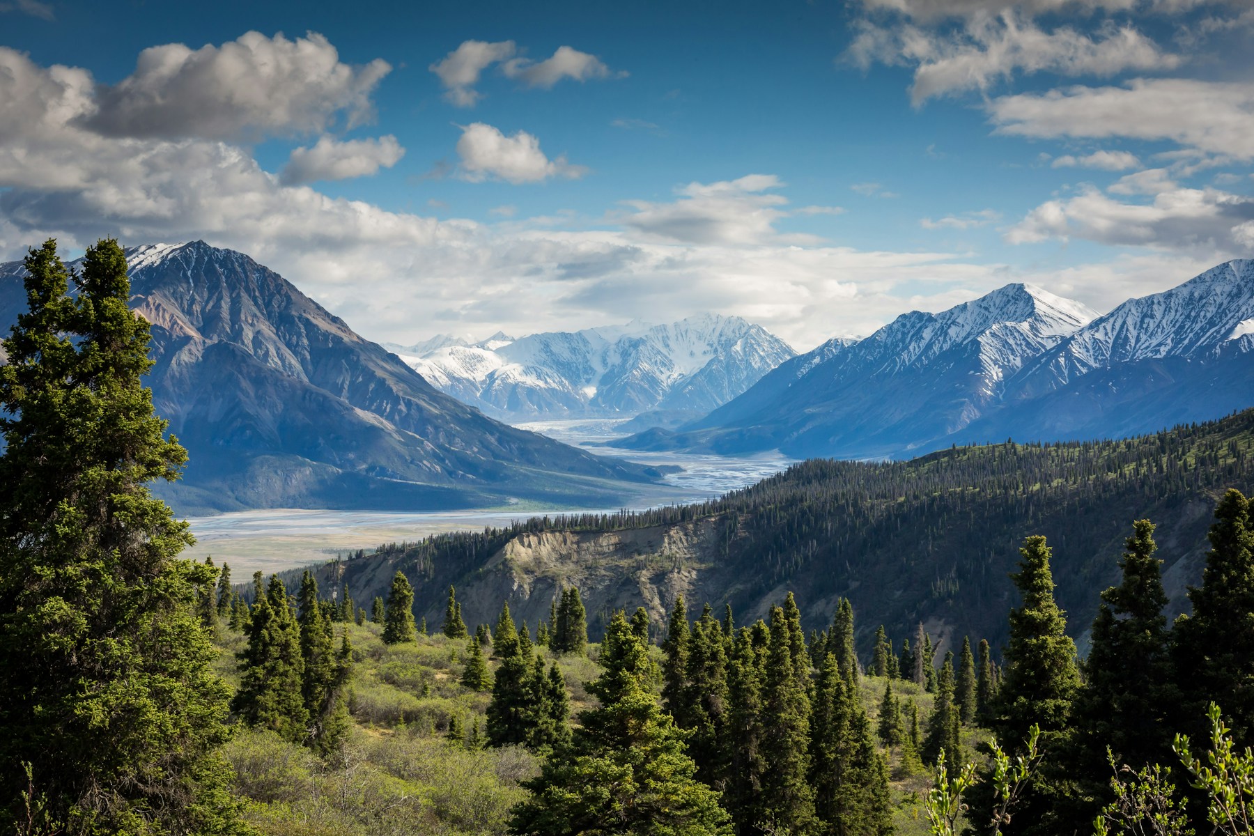 Mountain peaks beneath an open sky